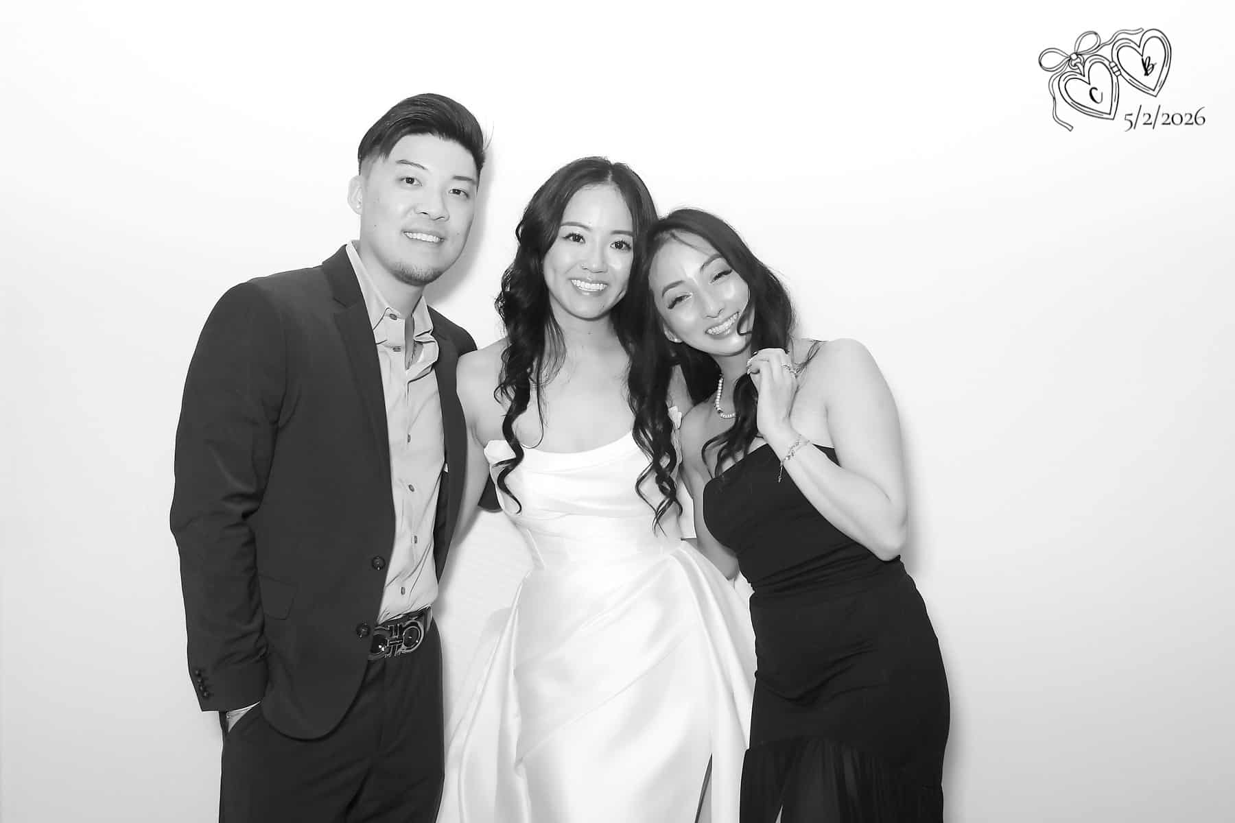 Luxury black and white Glam Booth portraits at a wedding reception
