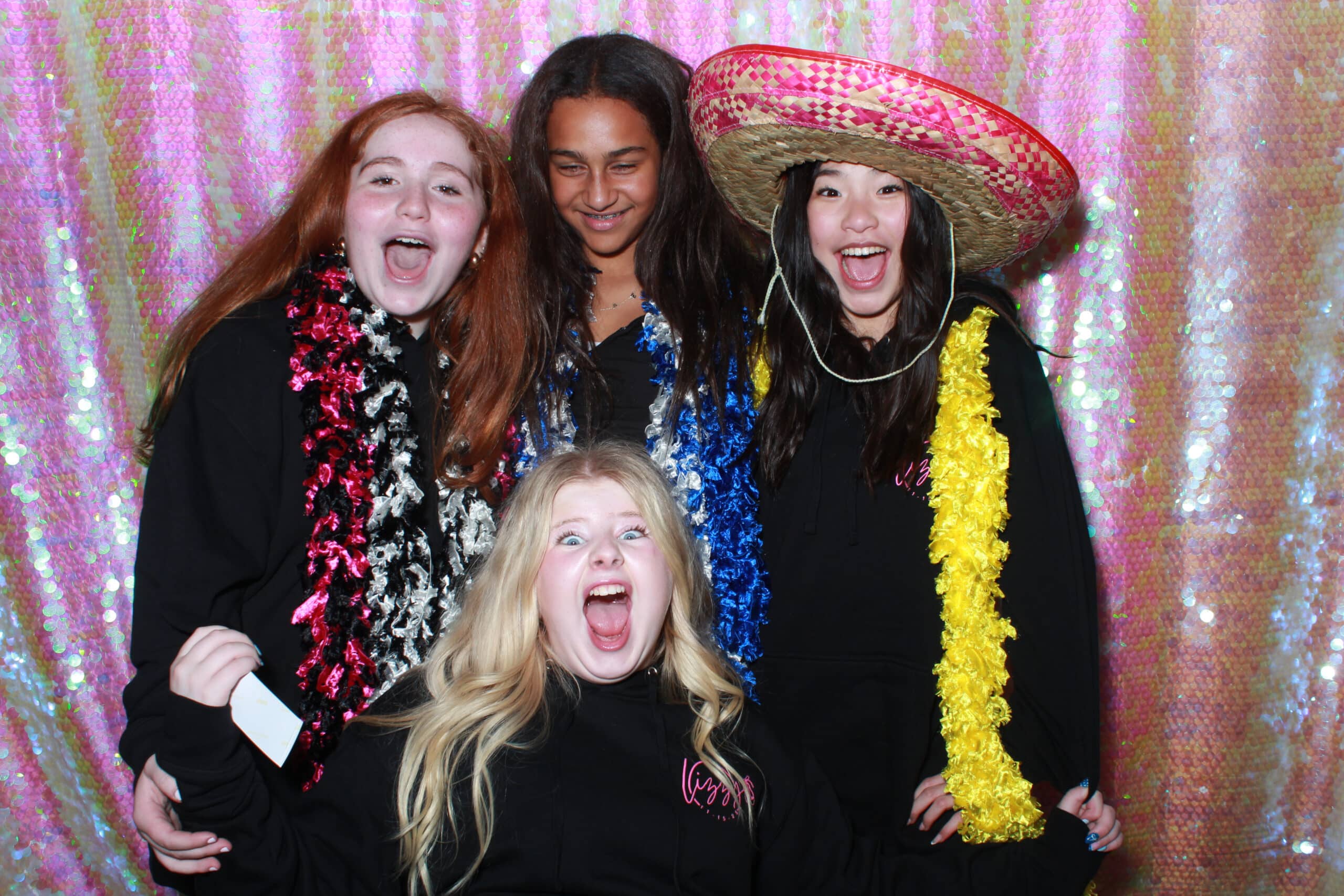 Bat Mitzvah guests creating keepsake photos with a luxury photo booth