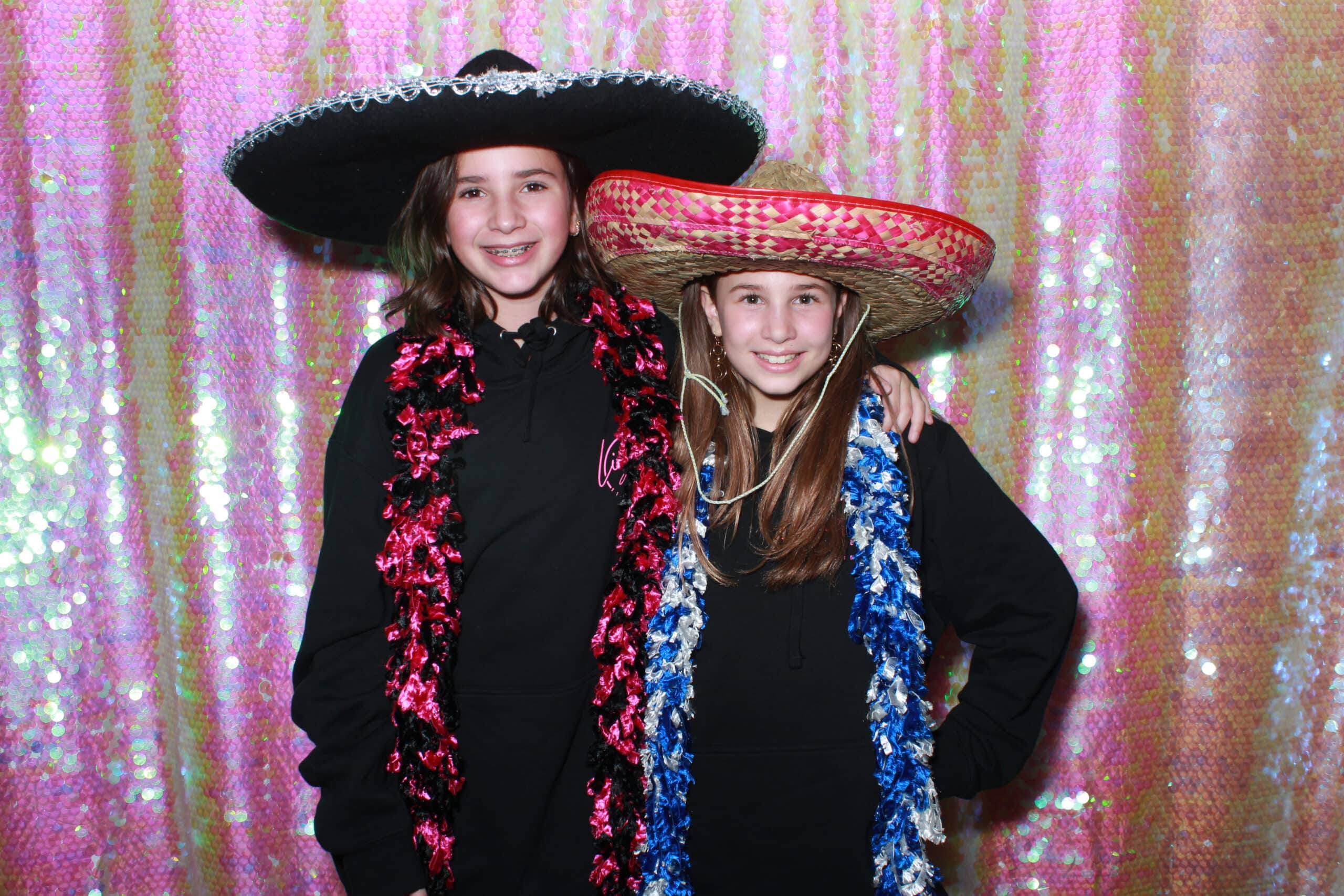 Sweet 16 party guests posing for photos at a Philadelphia celebration
