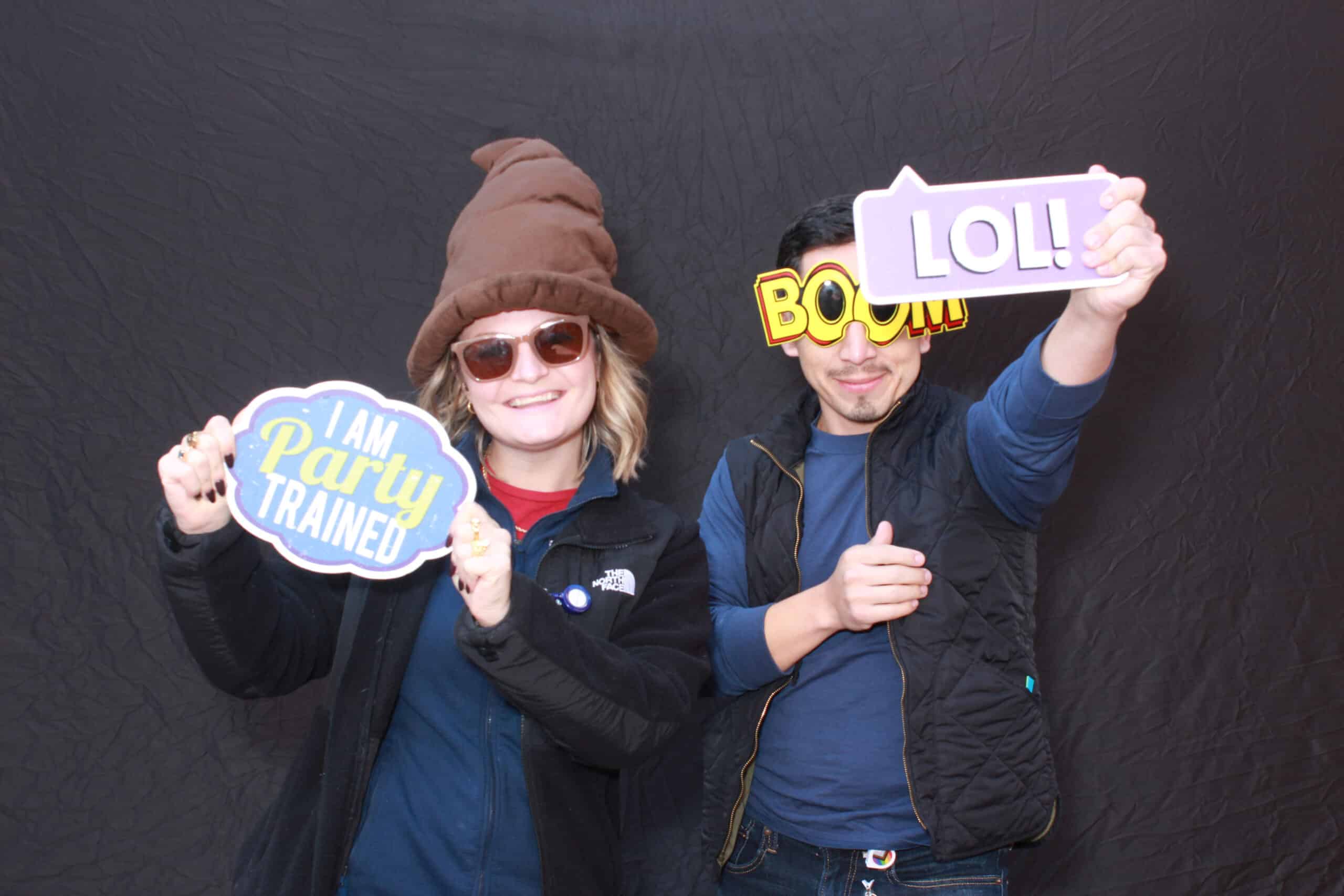 Corporate and social event guests enjoying a premium photo booth experience