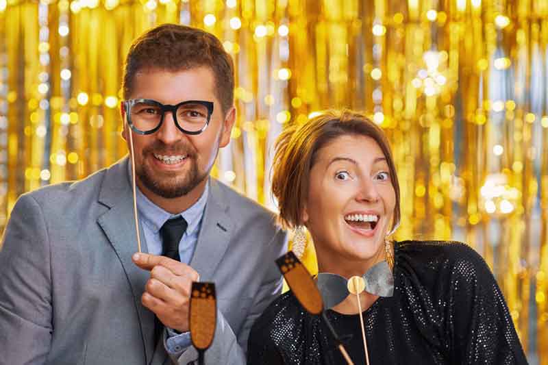 couple over gold with photo booth accessories on p 2025 01 07 12 26 17 utc